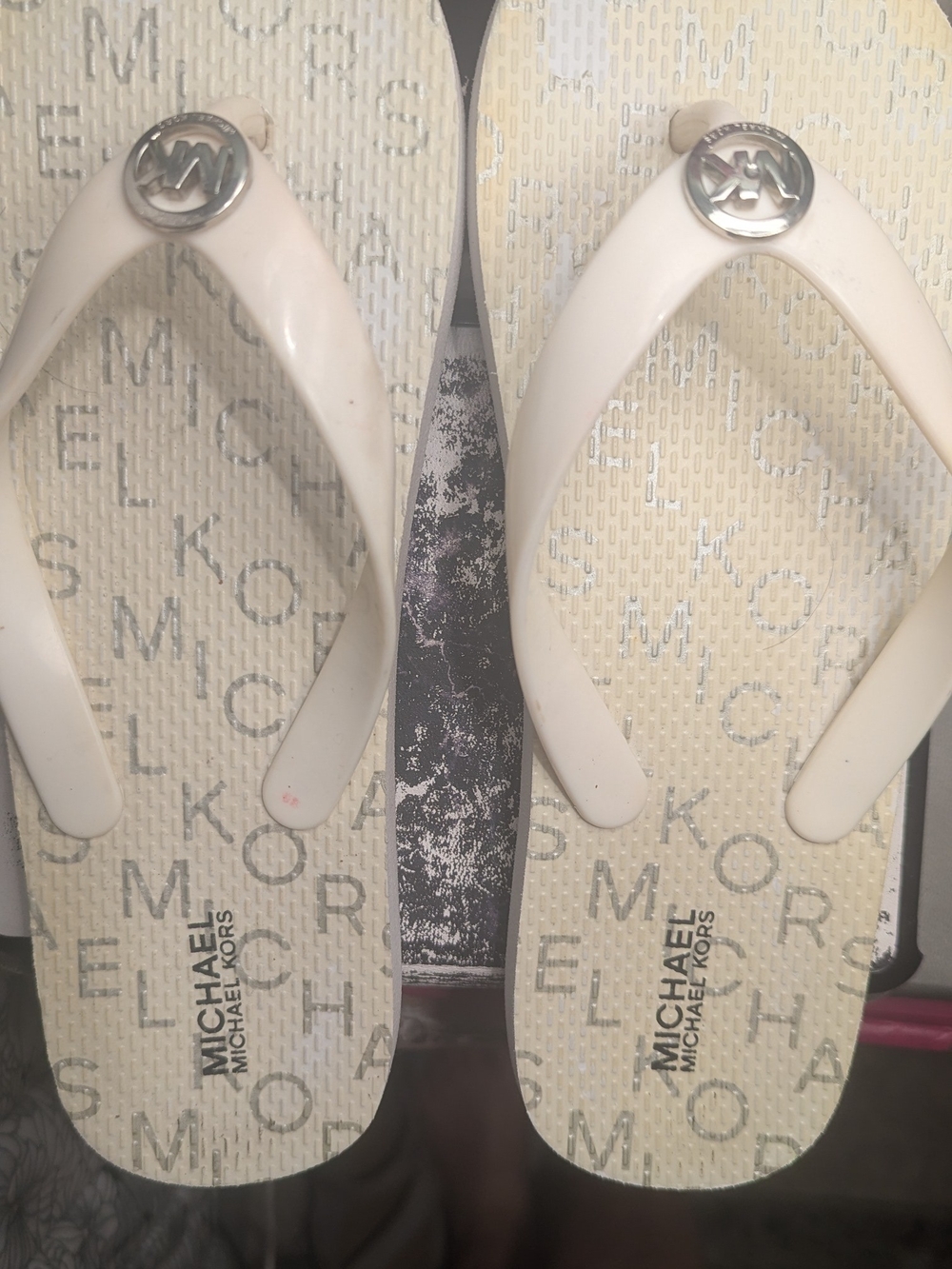 Michael Kors White Flip Flop with Silver MK Medallion